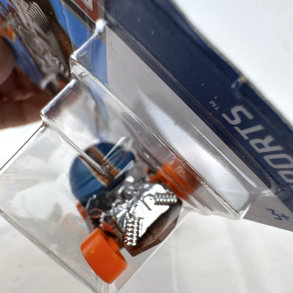 Hot Wheels Head Gasket diecast car in satin blue from the HW Sports series in original blister packaging