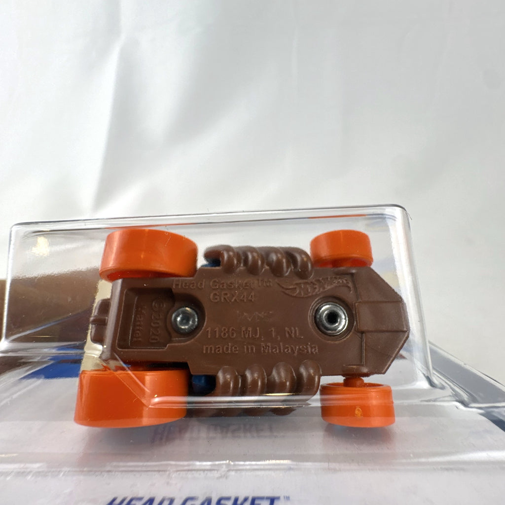 Hot Wheels Head Gasket diecast car in satin blue from the HW Sports series in original blister packaging