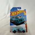 Hot Wheels Twinduction 1:64 scale diecast muscle car in light blue, factory sealed on original Muscle Mania card.