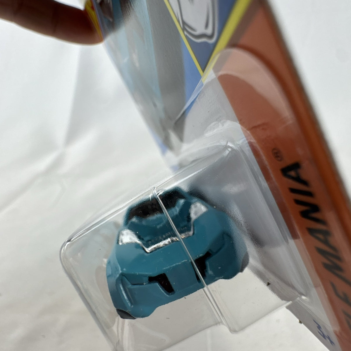 Hot Wheels Twinduction 1:64 scale diecast muscle car in light blue, factory sealed on original Muscle Mania card.