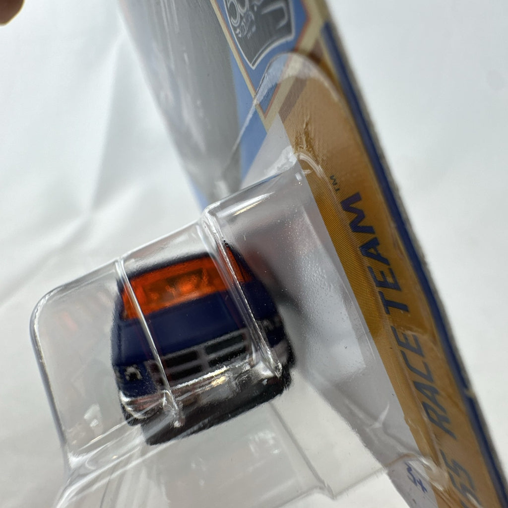 Hot Wheels 1:64 scale diecast Dodge Van in blue HW 55th Race Team anniversary livery.