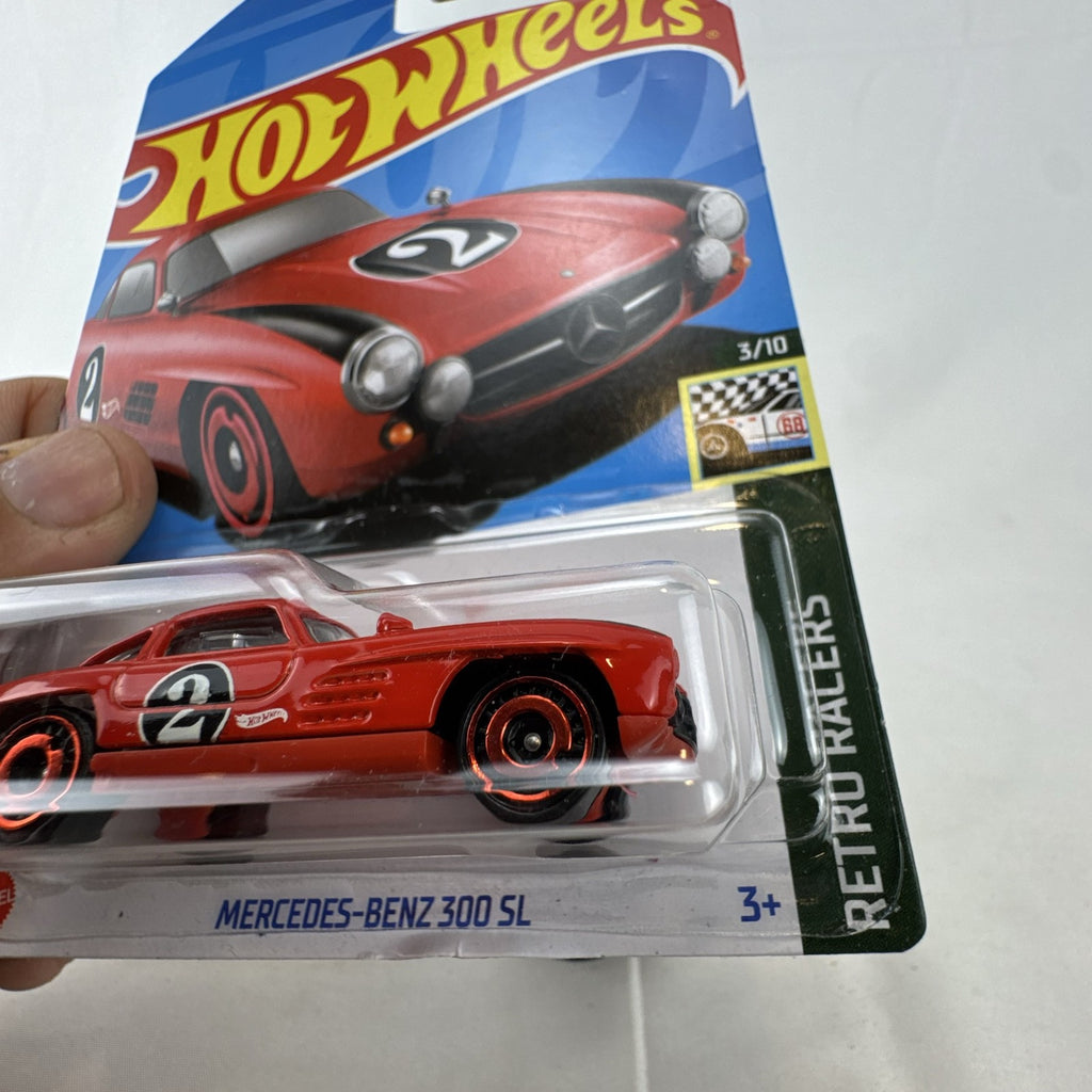 Hot Wheels 1:64 scale red Mercedes-Benz 300 SL Retro Racers diecast model car on blister card