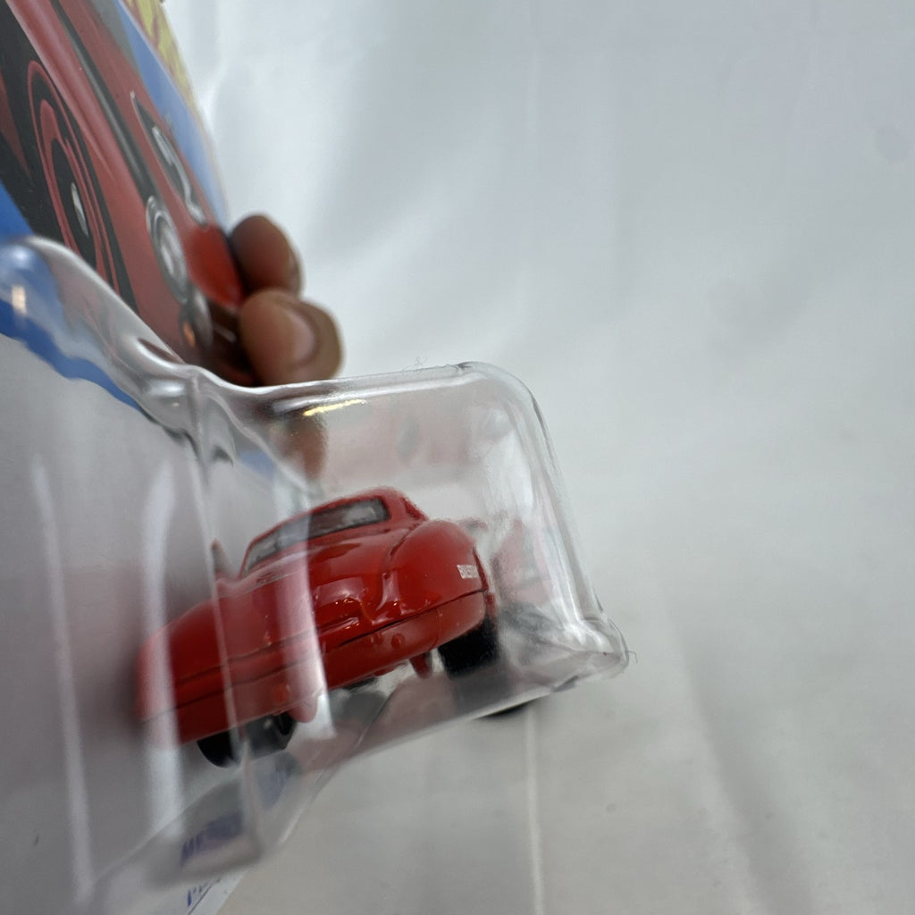 Hot Wheels 1:64 scale red Mercedes-Benz 300 SL Retro Racers diecast model car on blister card