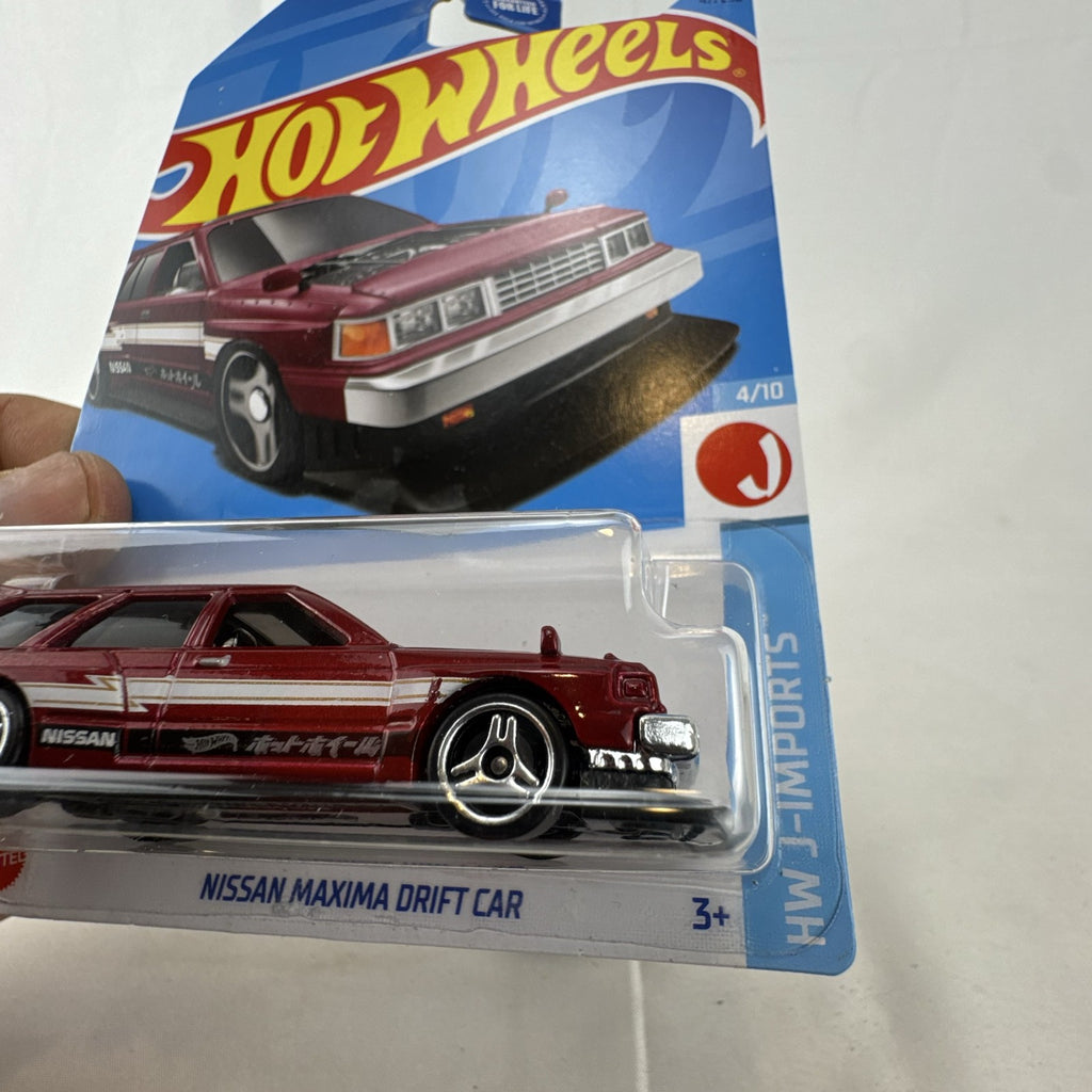 Hot Wheels 1:64 scale Nissan Maxima Drift Car in maroon from the HW J-Imports series factory sealed on card
