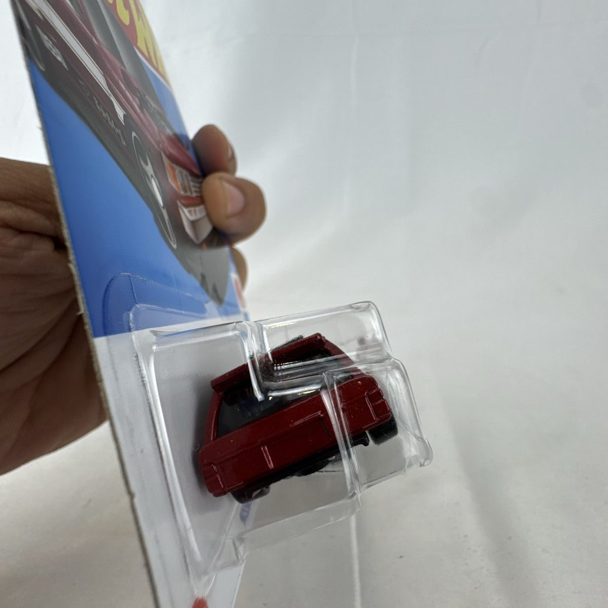 Hot Wheels 1:64 scale Nissan Maxima Drift Car in maroon from the HW J-Imports series factory sealed on card