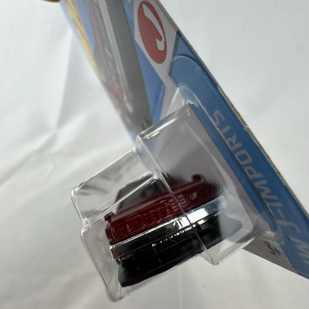 Hot Wheels 1:64 scale Nissan Maxima Drift Car in maroon from the HW J-Imports series factory sealed on card