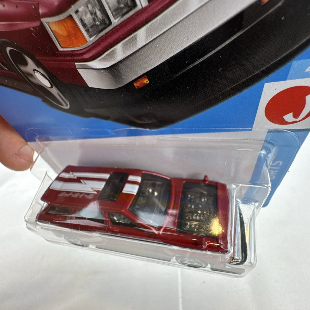 Hot Wheels 1:64 scale Nissan Maxima Drift Car in maroon from the HW J-Imports series factory sealed on card