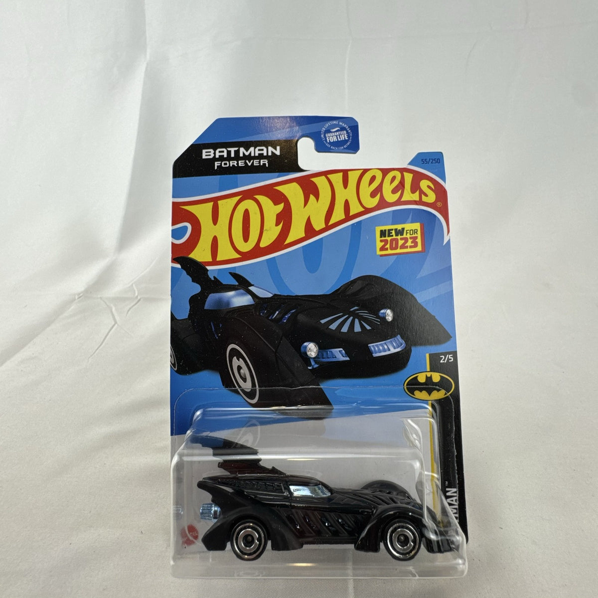 Hot Wheels 1:64 scale Batman Forever Batmobile diecast car in satin black, factory sealed on original card package.