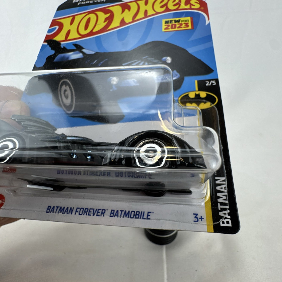 Hot Wheels 1:64 scale Batman Forever Batmobile diecast car in satin black, factory sealed on original card package.