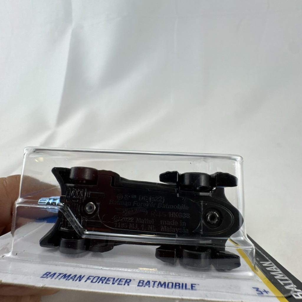 Hot Wheels 1:64 scale Batman Forever Batmobile diecast car in satin black, factory sealed on original card package.