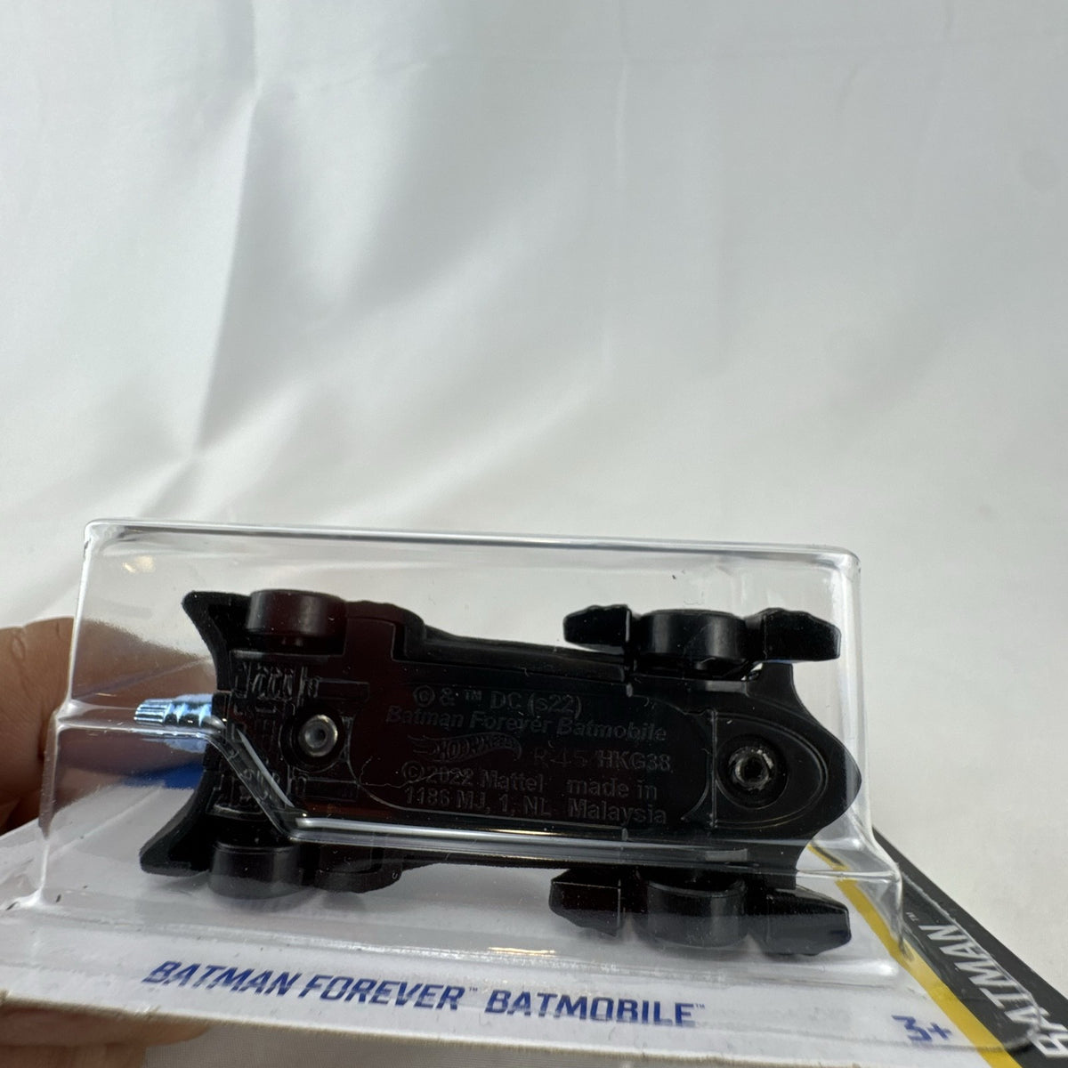 Hot Wheels 1:64 scale Batman Forever Batmobile diecast car in satin black, factory sealed on original card package.