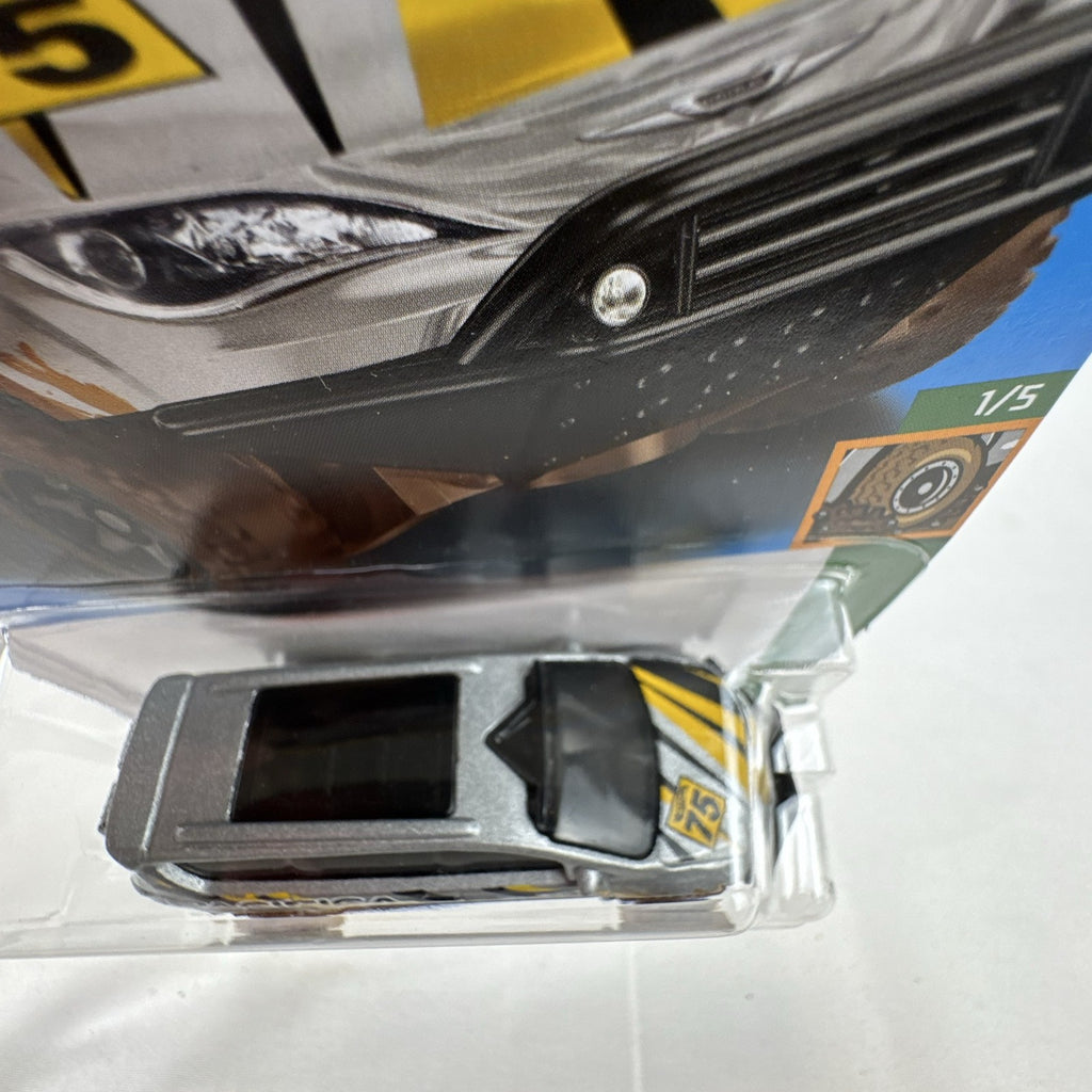 Hot Wheels Mud Studs Chrysler Pacifica off-road minivan 1:64 scale diecast model in original blister packaging
