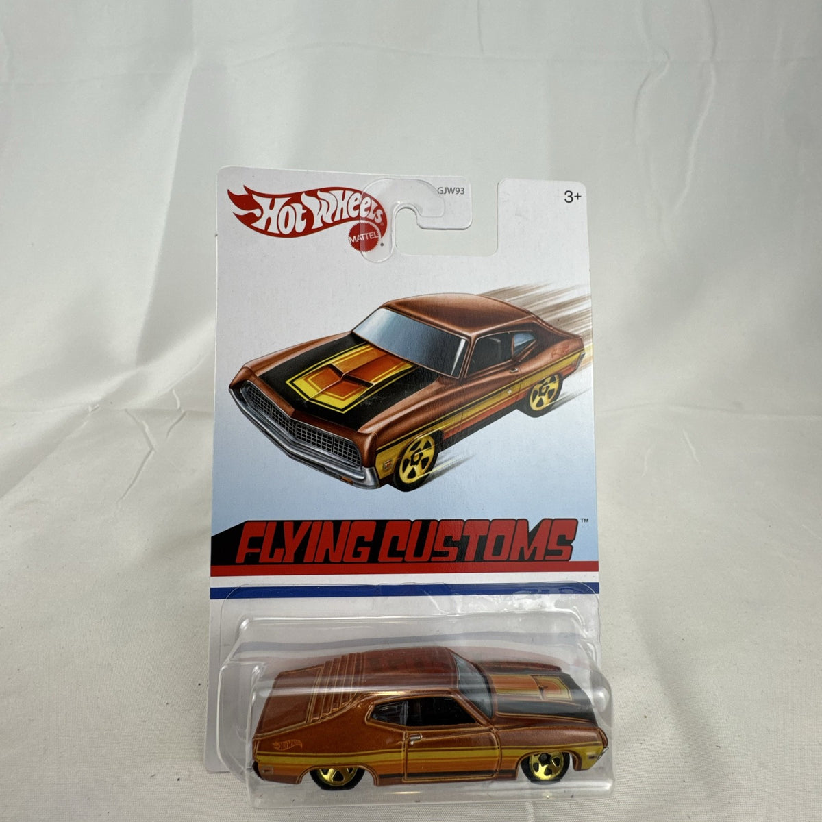 Hot Wheels 1970 Ford Torino Flying Customs 1:64 diecast car in metallic brown on original blister card