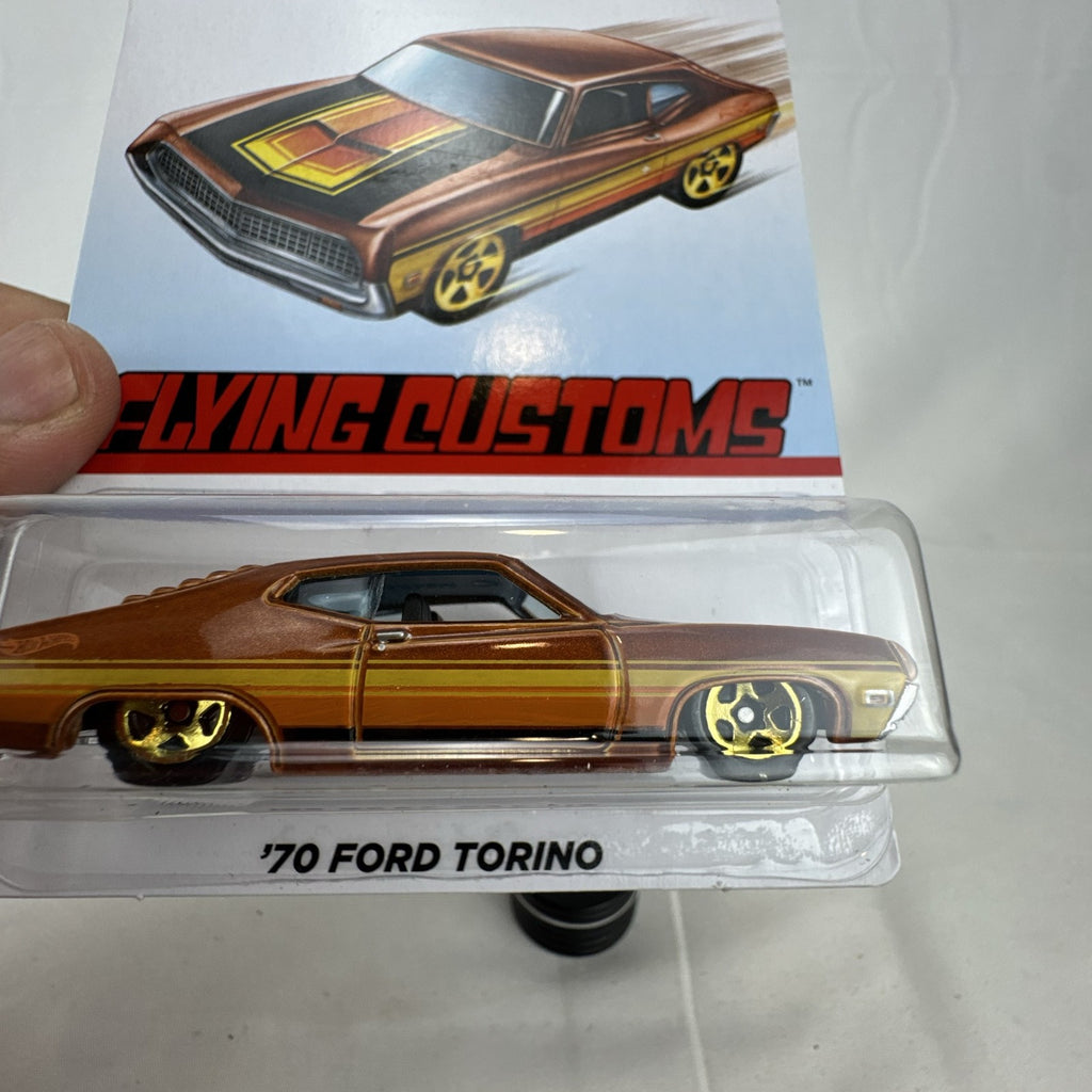 Hot Wheels 1970 Ford Torino Flying Customs 1:64 diecast car in metallic brown on original blister card