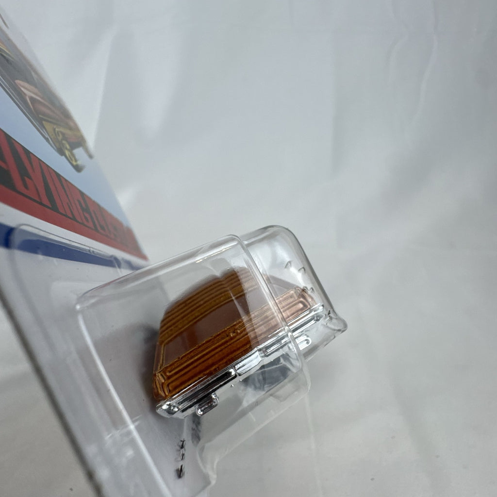 Hot Wheels 1970 Ford Torino Flying Customs 1:64 diecast car in metallic brown on original blister card
