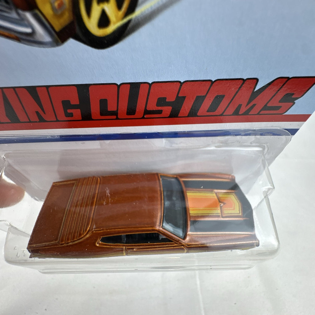 Hot Wheels 1970 Ford Torino Flying Customs 1:64 diecast car in metallic brown on original blister card