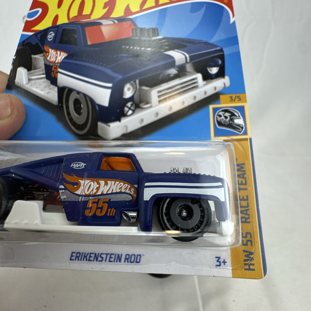 Hot Wheels 1:64 scale Erikenstein Rod diecast pickup truck in dark blue 55th Anniversary packaging