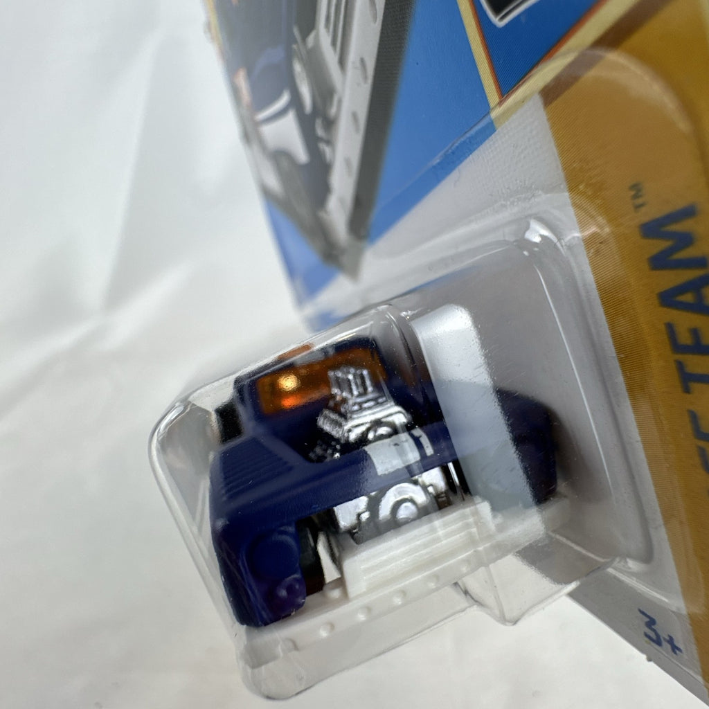 Hot Wheels 1:64 scale Erikenstein Rod diecast pickup truck in dark blue 55th Anniversary packaging