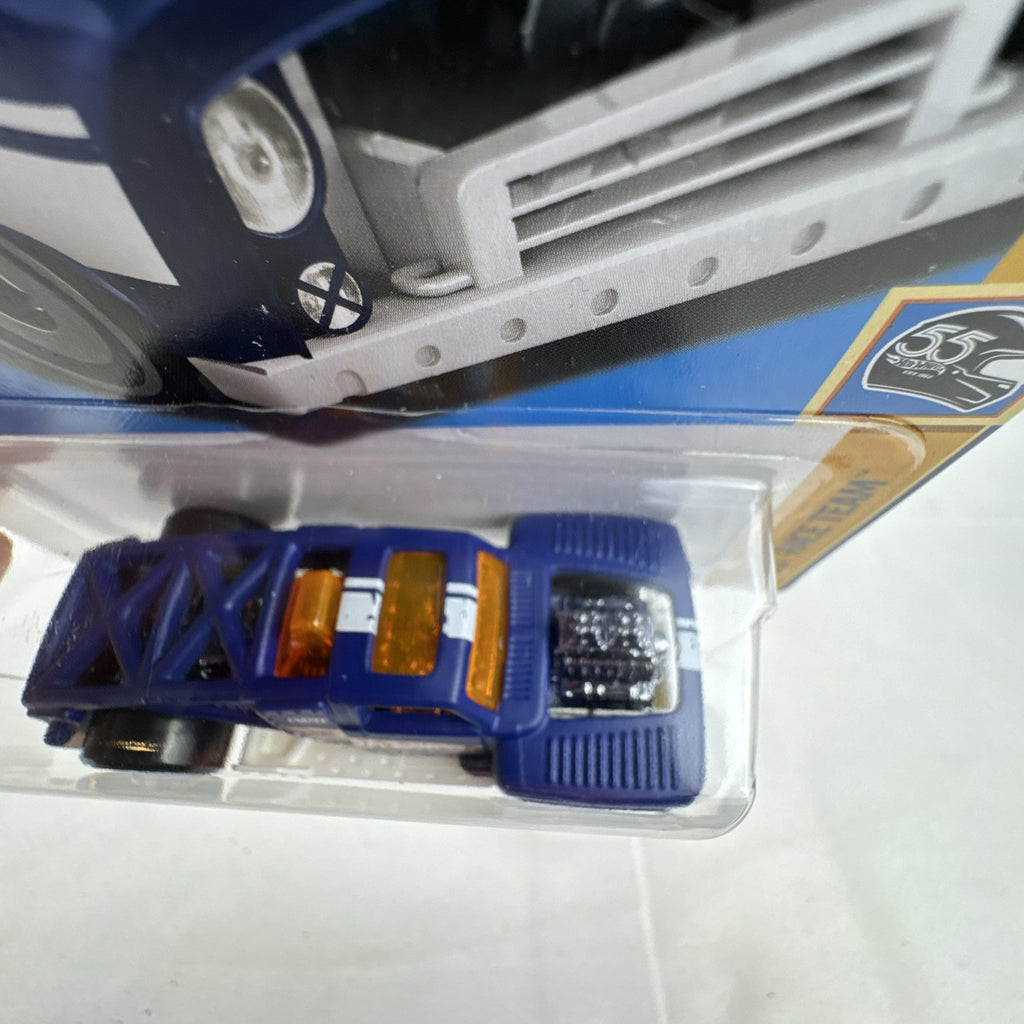 Hot Wheels 1:64 scale Erikenstein Rod diecast pickup truck in dark blue 55th Anniversary packaging