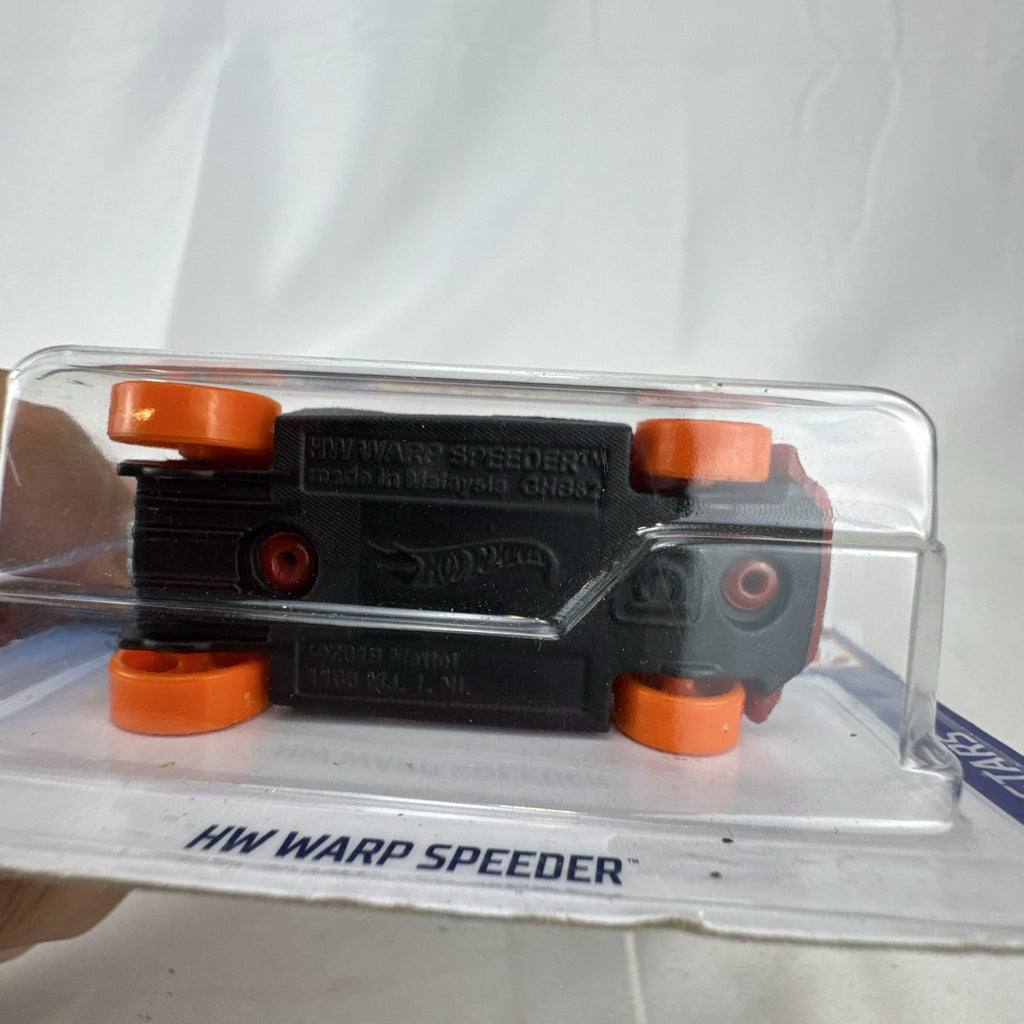 Hot Wheels 1:64 scale HW Warp Speeder diecast car in unopened original blister packaging.