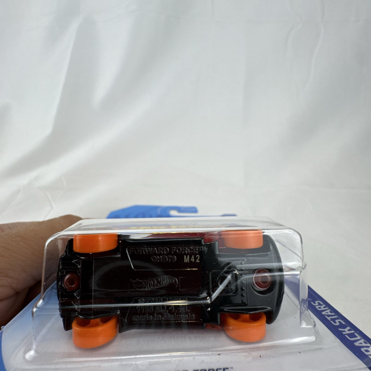 Sealed 2020 Hot Wheels 1:64 scale Forward Force diecast car in translucent red on original blister card