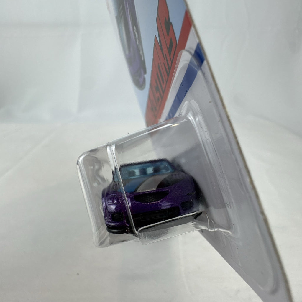 Factory sealed Hot Wheels Flying Customs Audacious 1:64 scale diecast tuner wagon in metallic purple with speed stripes.