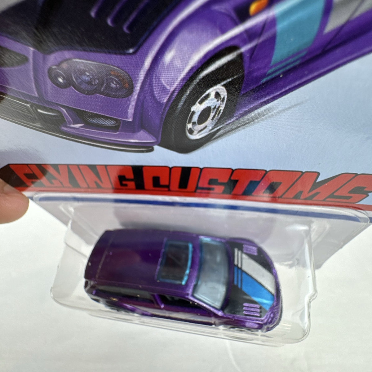 Factory sealed Hot Wheels Flying Customs Audacious 1:64 scale diecast tuner wagon in metallic purple with speed stripes.