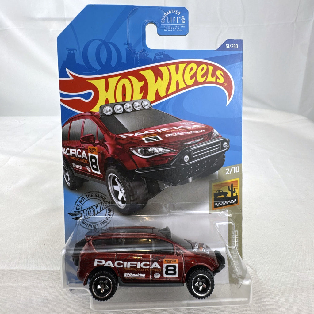 Hot Wheels 1:64 scale red Chrysler Pacifica off-road diecast van in original Baja Blazers blister card packaging.