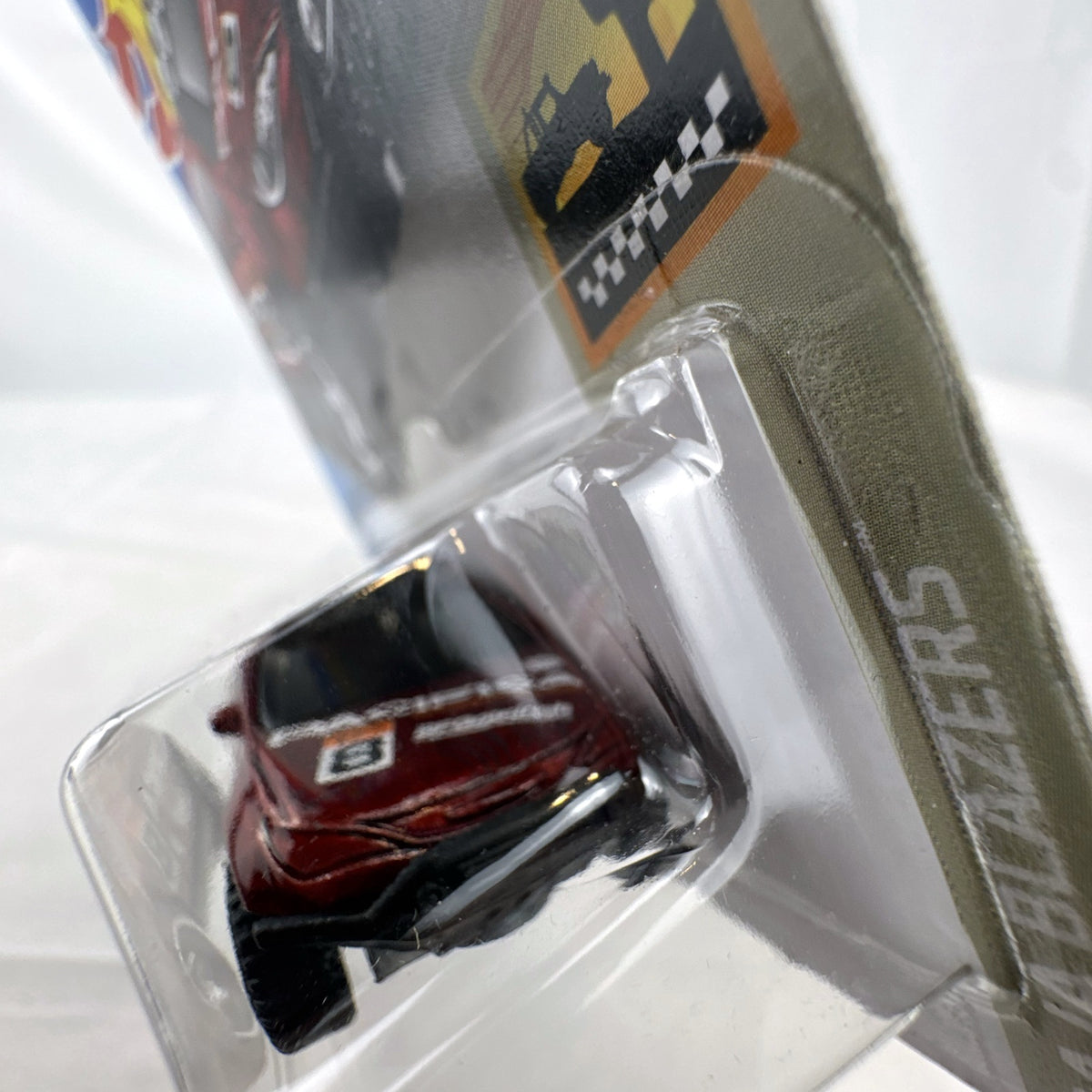 Hot Wheels 1:64 scale red Chrysler Pacifica off-road diecast van in original Baja Blazers blister card packaging.