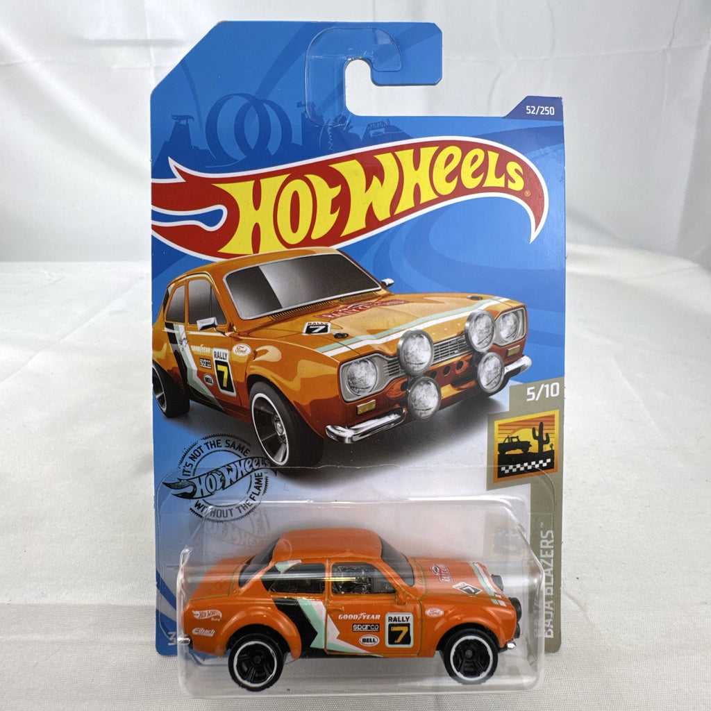 Hot Wheels 1:64 scale 1970 Ford Escort RS1600 diecast rally car in orange sealed on card