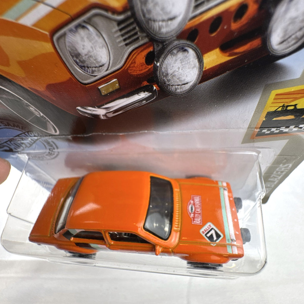 Hot Wheels 1:64 scale 1970 Ford Escort RS1600 diecast rally car in orange sealed on card