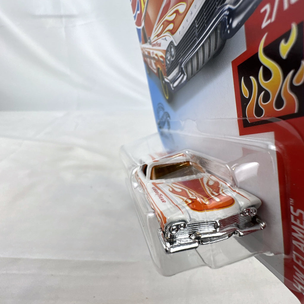 Hot Wheels 1:64 scale '57 Plymouth Fury diecast car in white with HW Flames graphics in original sealed packaging.