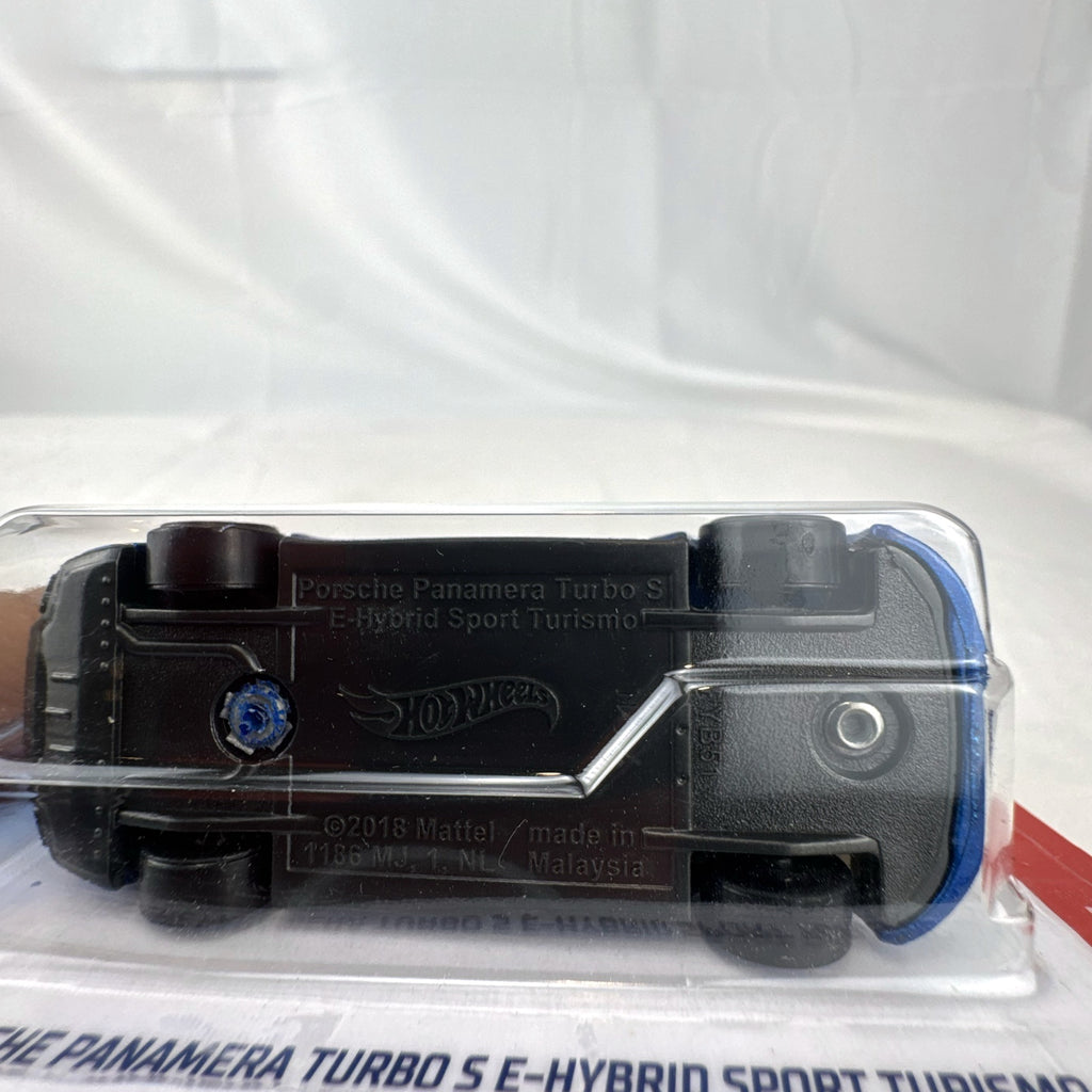 Hot Wheels 1:64 scale Porsche Panamera Turbo S E-Hybrid Sport Turismo in metallic blue diecast sealed on card