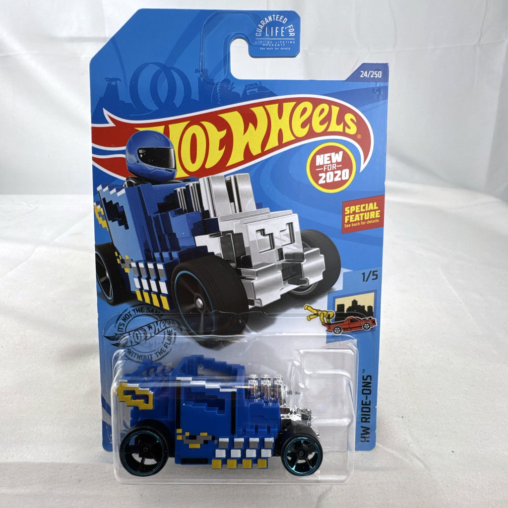 Hot Wheels Pixel Shaker 1:64 scale diecast car in blue with 8-bit graphics, factory sealed on original card.