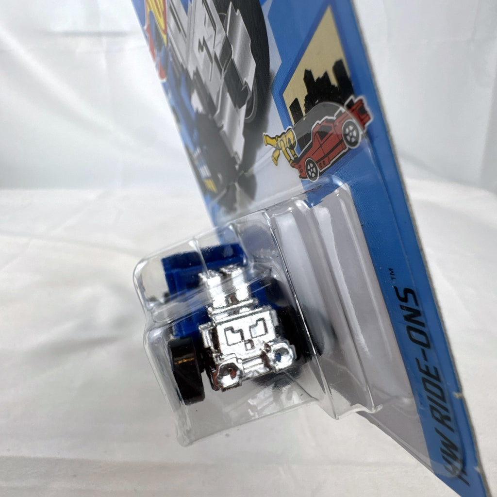 Hot Wheels Pixel Shaker 1:64 scale diecast car in blue with 8-bit graphics, factory sealed on original card.