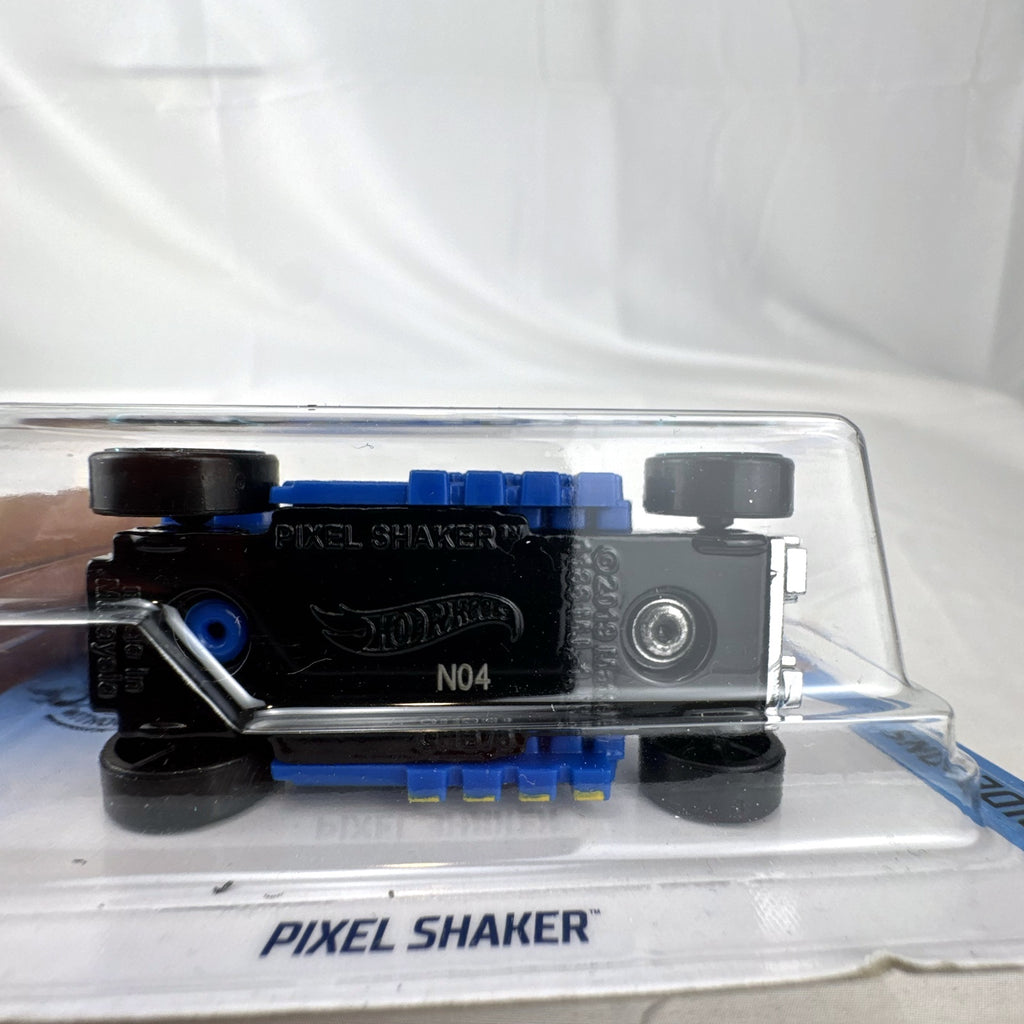 Hot Wheels Pixel Shaker 1:64 scale diecast car in blue with 8-bit graphics, factory sealed on original card.