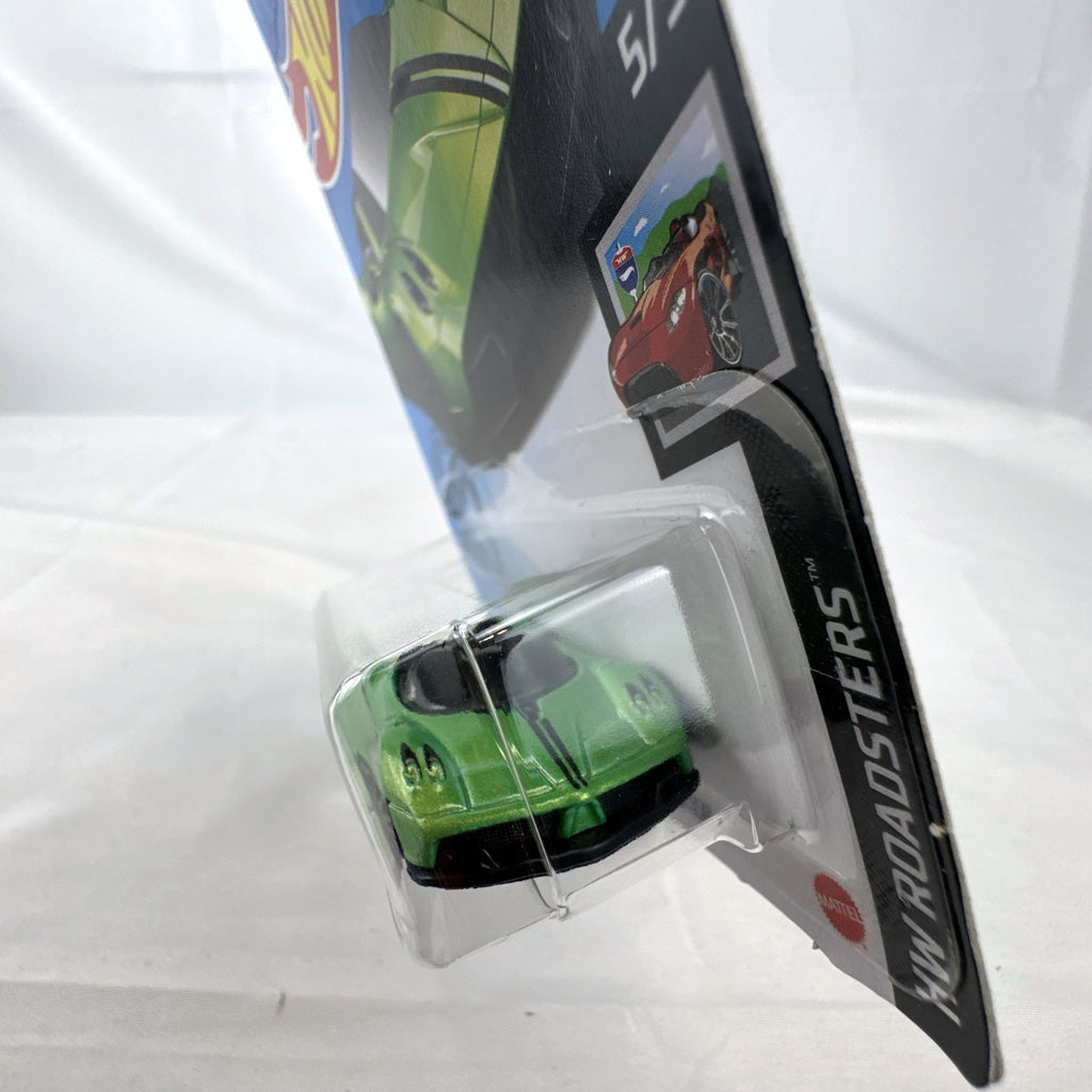 Hot Wheels 2017 Pagani Huayra Roadster 1:64 scale diecast car in metallic green packaged on original blister card.