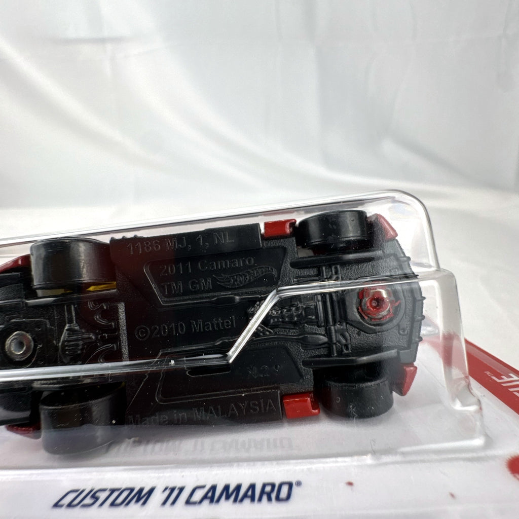 Hot Wheels Custom '11 Chevrolet Camaro HW Rescue diecast car in red, sealed on original backing card.