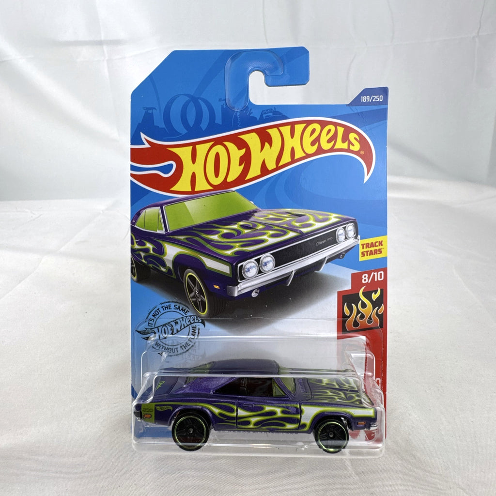 Hot Wheels 1:64 scale 1969 Dodge Charger 500 HW Flames diecast car in purple unopened packaging.
