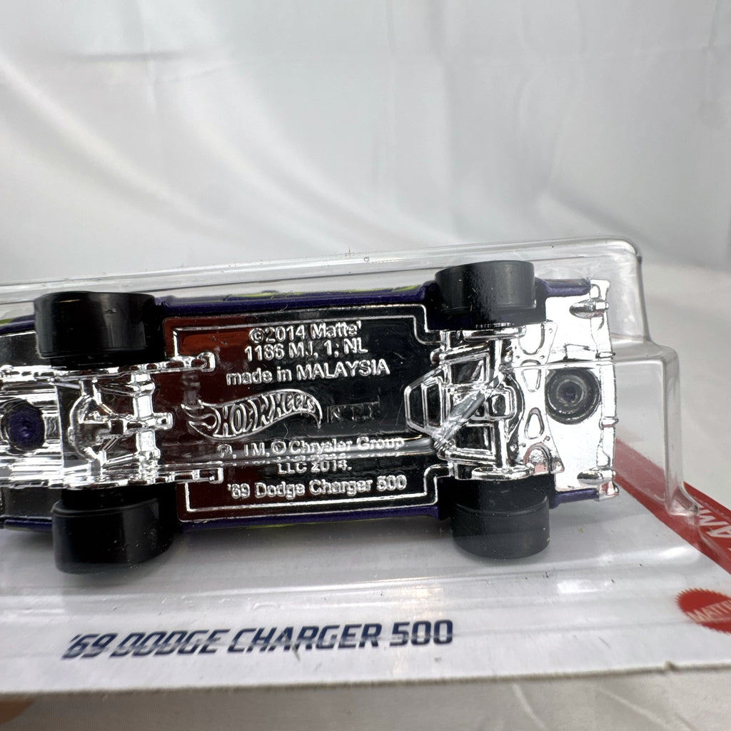 Hot Wheels 1:64 scale 1969 Dodge Charger 500 HW Flames diecast car in purple unopened packaging.