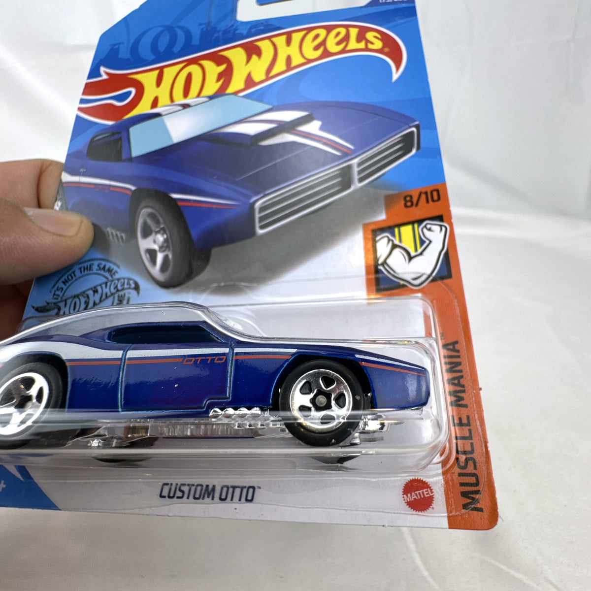 Hot Wheels 1:64 scale Custom Otto diecast muscle car in deep blue sealed on original blister card.