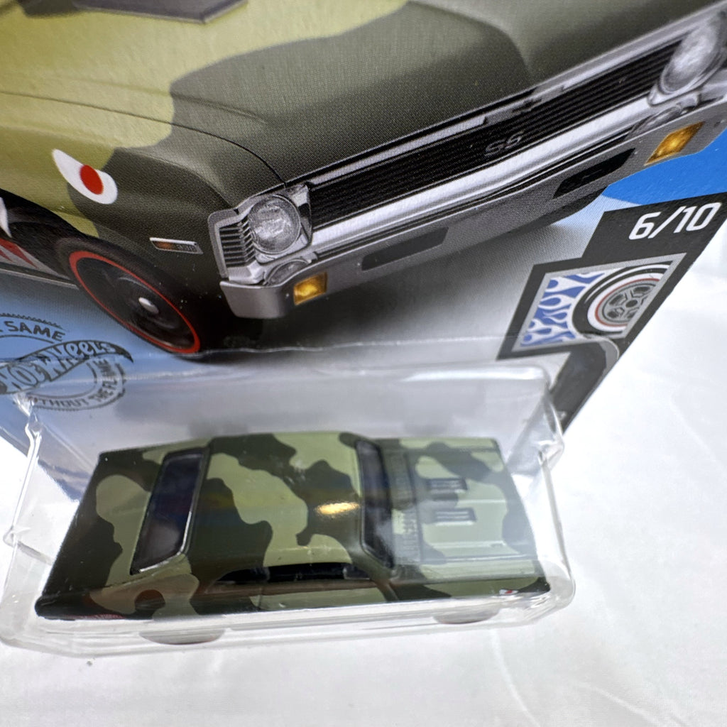 Factory sealed 1:64 scale Hot Wheels 1968 Chevy Nova diecast car in green camouflage with shark teeth graphics