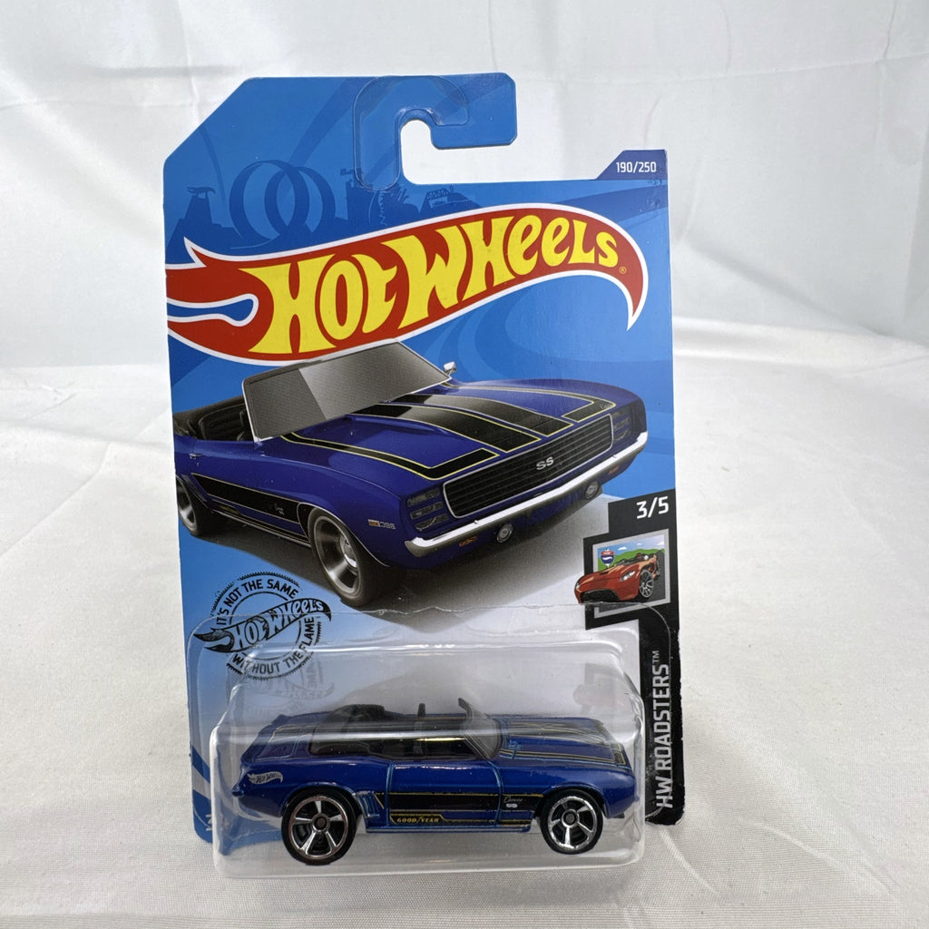 Hot Wheels 1:64 scale 1969 Chevrolet Camaro SS Convertible in deep blue with black and gold racing stripes on original card