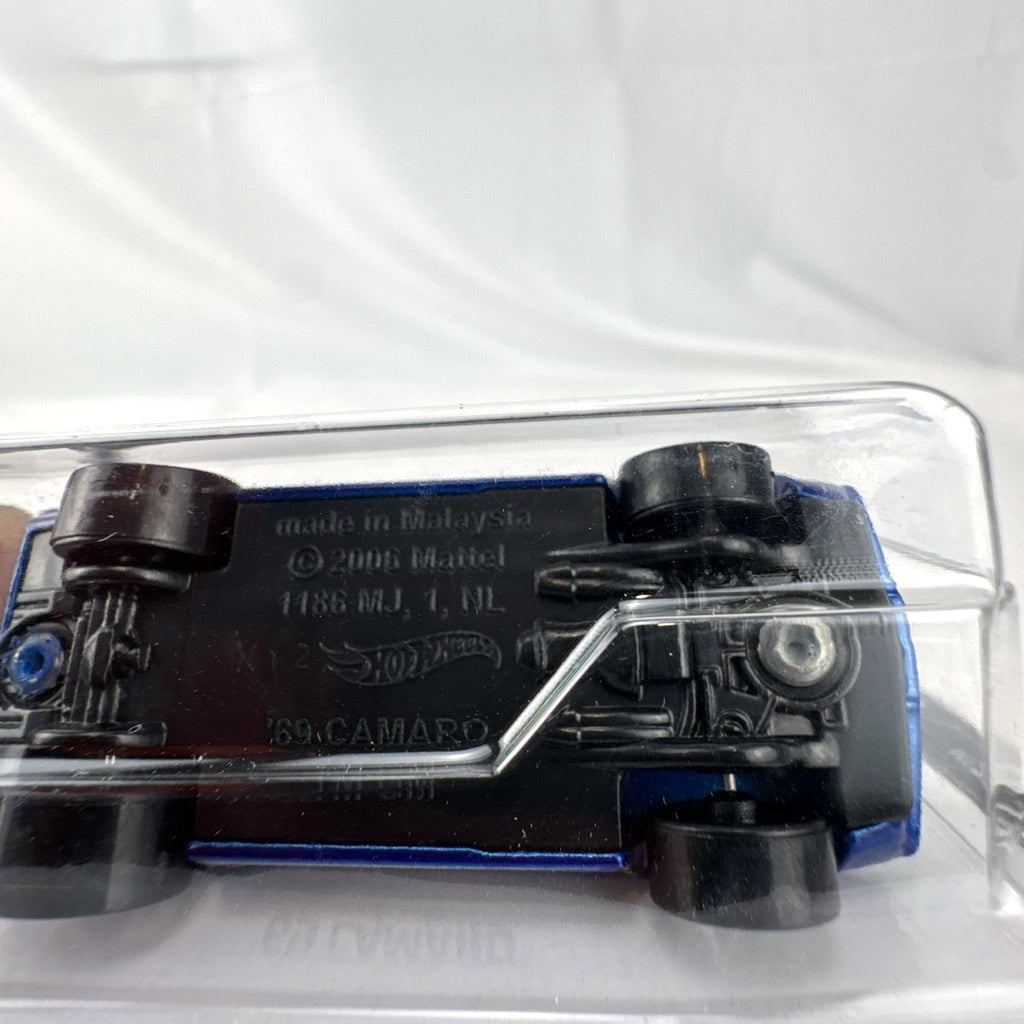 Hot Wheels 1:64 scale 1969 Chevrolet Camaro SS Convertible in deep blue with black and gold racing stripes on original card