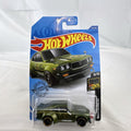 Hot Wheels 1:64 scale Mazda RX-3 diecast car in metallic olive green with GReddy graphics on blister card