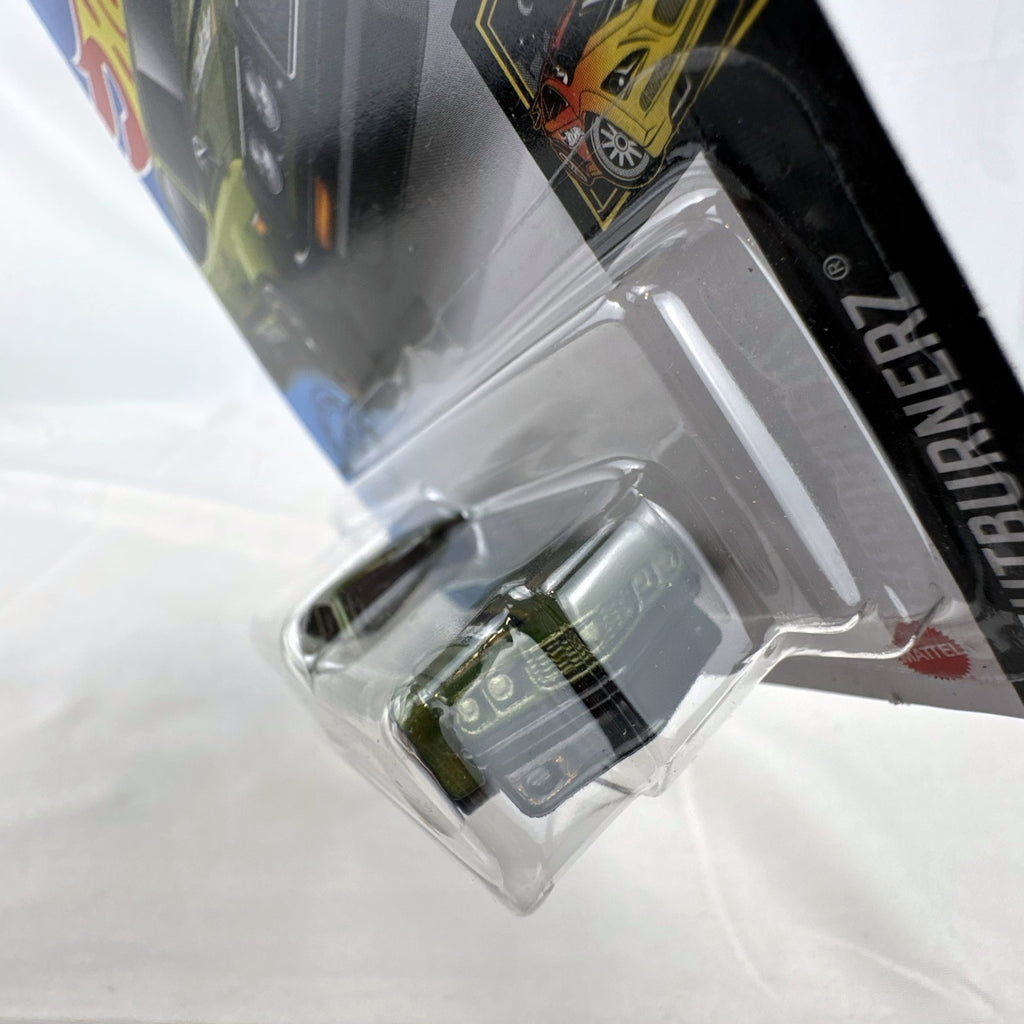Hot Wheels 1:64 scale Mazda RX-3 diecast car in metallic olive green with GReddy graphics on blister card