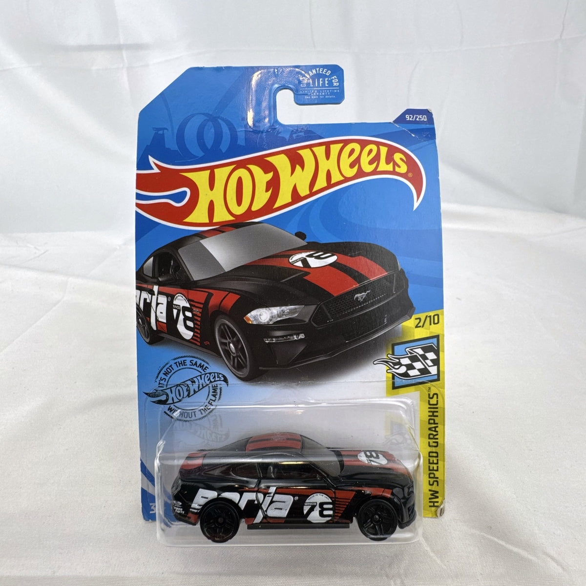 Sealed Hot Wheels 2018 Ford Mustang GT diecast car in black with red stripes and Borla graphics in blister pack