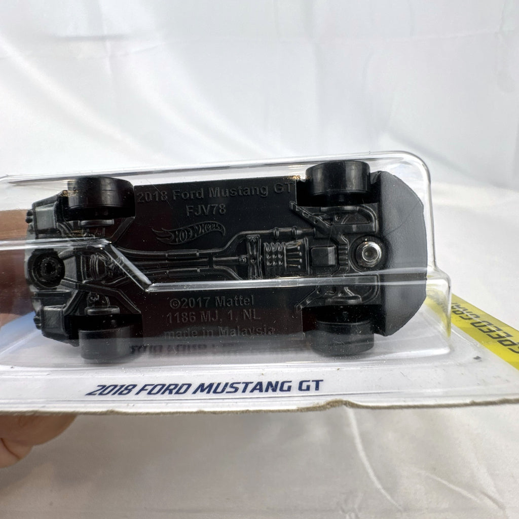 Sealed Hot Wheels 2018 Ford Mustang GT diecast car in black with red stripes and Borla graphics in blister pack