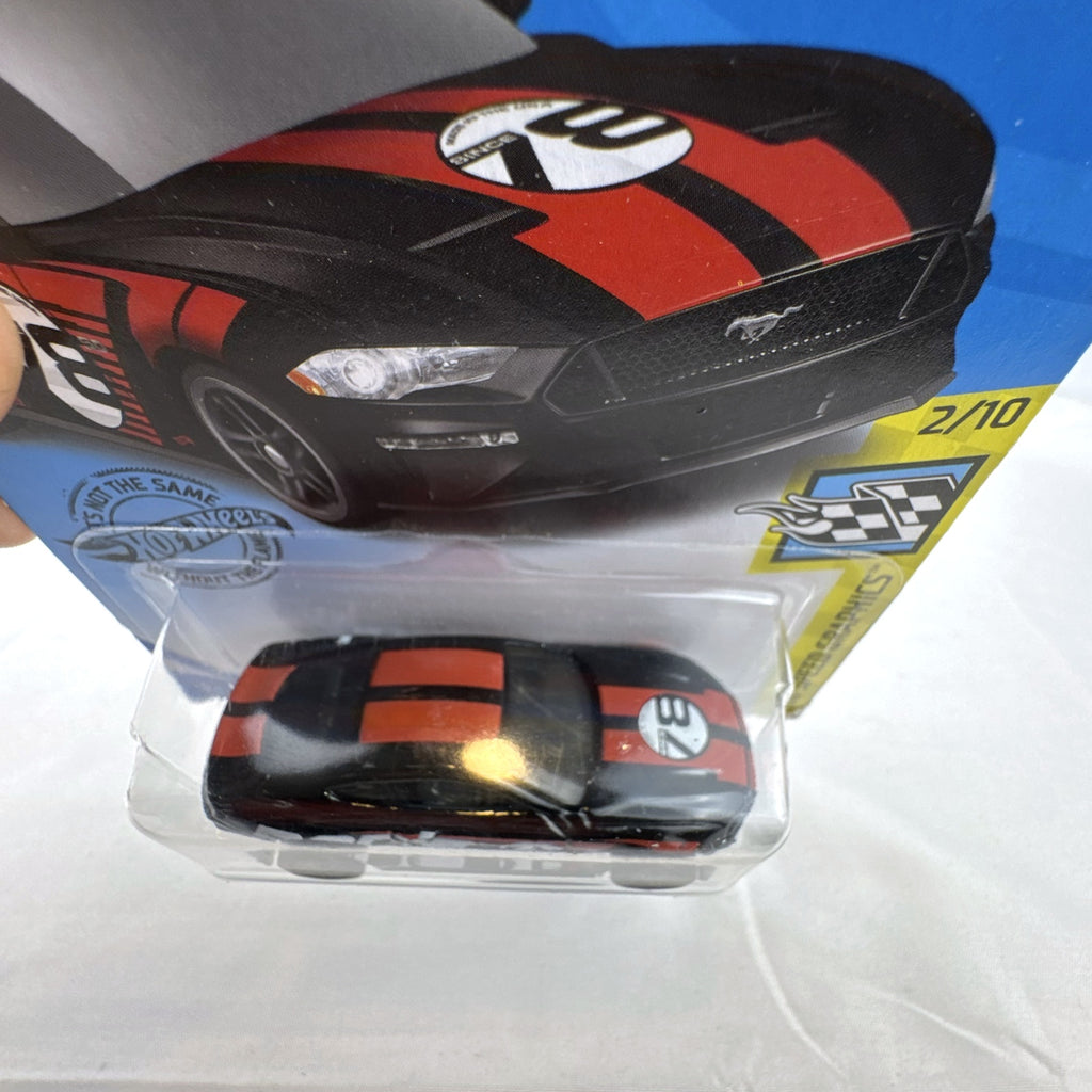 Sealed Hot Wheels 2018 Ford Mustang GT diecast car in black with red stripes and Borla graphics in blister pack