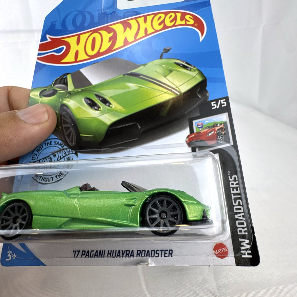 Sealed Hot Wheels 2017 Pagani Huayra Roadster 1:64 diecast car in metallic lime green on original blister card.